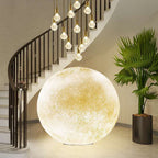 Lune moon floor lamp glowing in a bedroom
