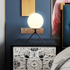 Filaire gold table lamp styled in a minimalist interior