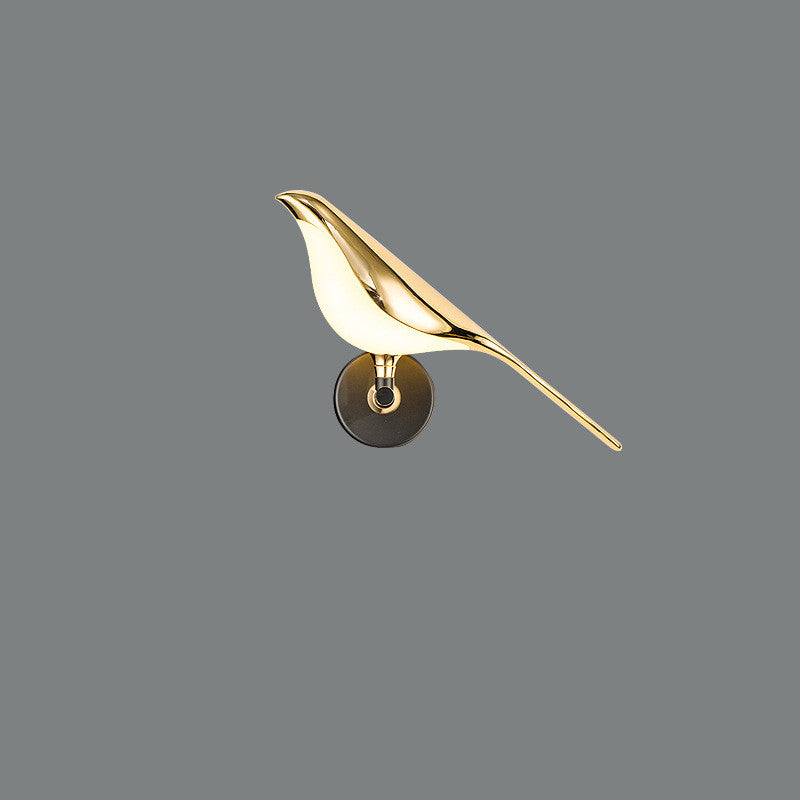 Corvus Sculptural Bird Wall Sconce - mounted on living room wall