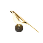 Corvus Sculptural Bird Wall Sconce - illuminated warm glow at dusk