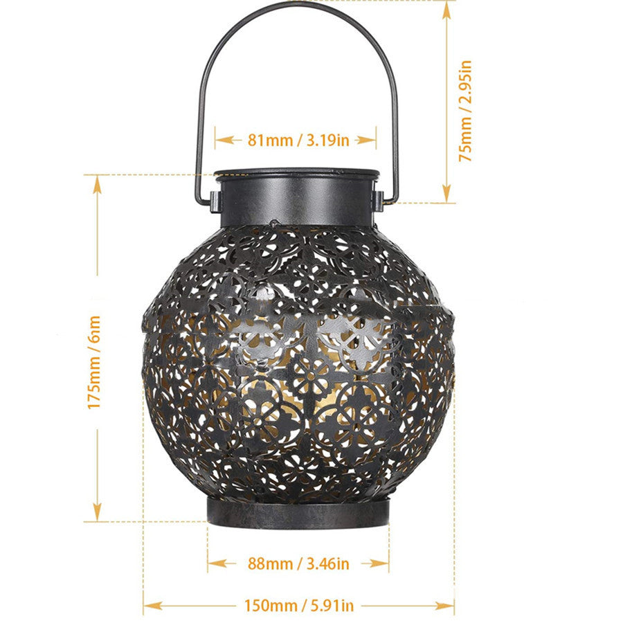 Jardin Wrought-Iron Solar Garden Lantern - illuminated warm glow at dusk