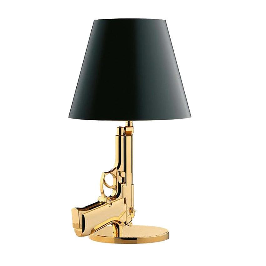 Petit Or lamp styled on a corner desk