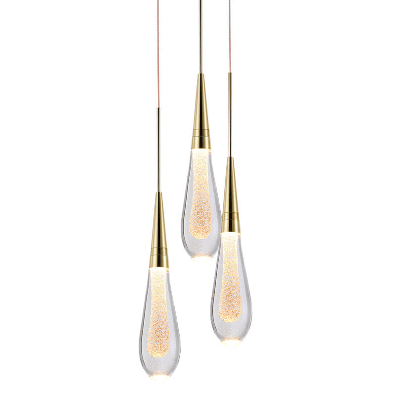Aurelia Cascade Crystal Chandelier - illuminated in living room setting