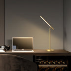 Articulé lamp detail of brass rocker arm joint