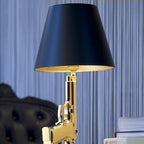 Petit Or desk lamp switched on