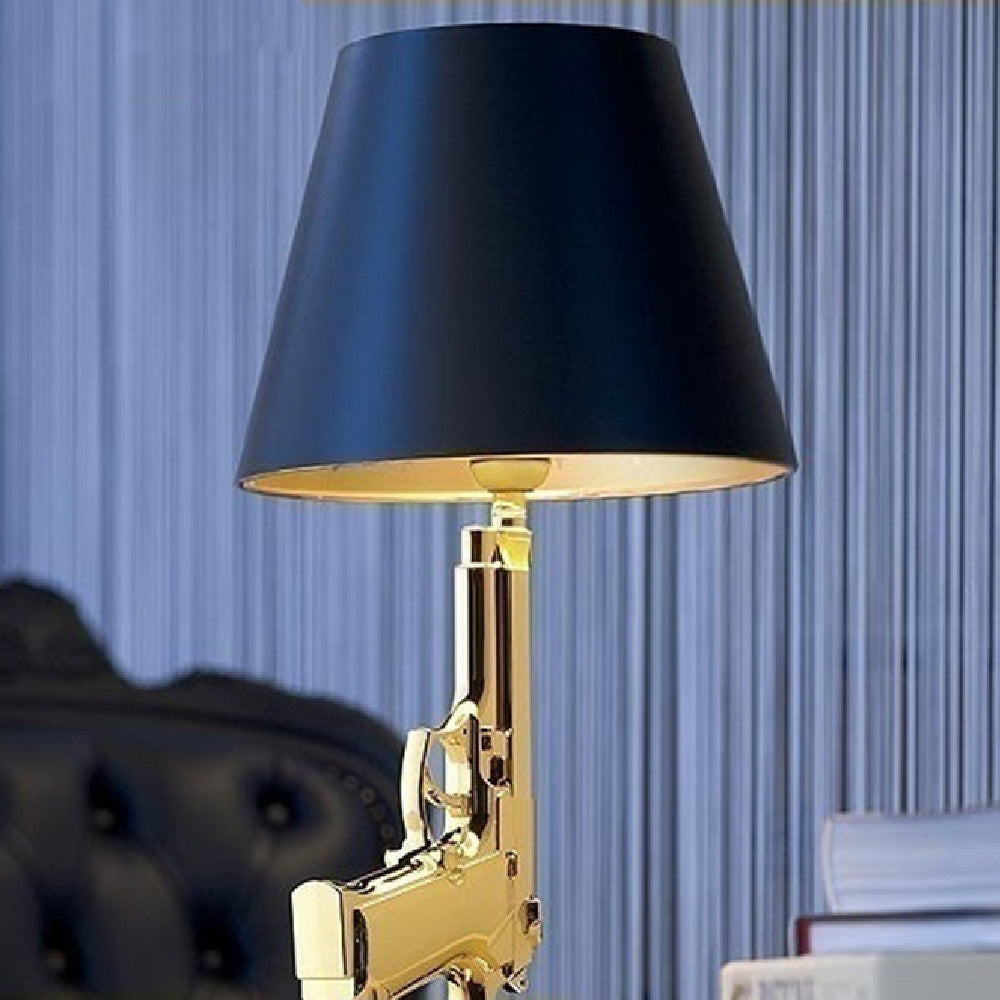 Petit Or desk lamp switched on