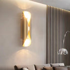 Solstice Marble-Finish Wall Sconce - mounted above living room console