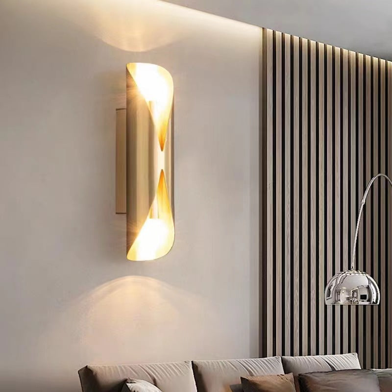 Solstice Marble-Finish Wall Sconce - mounted above living room console