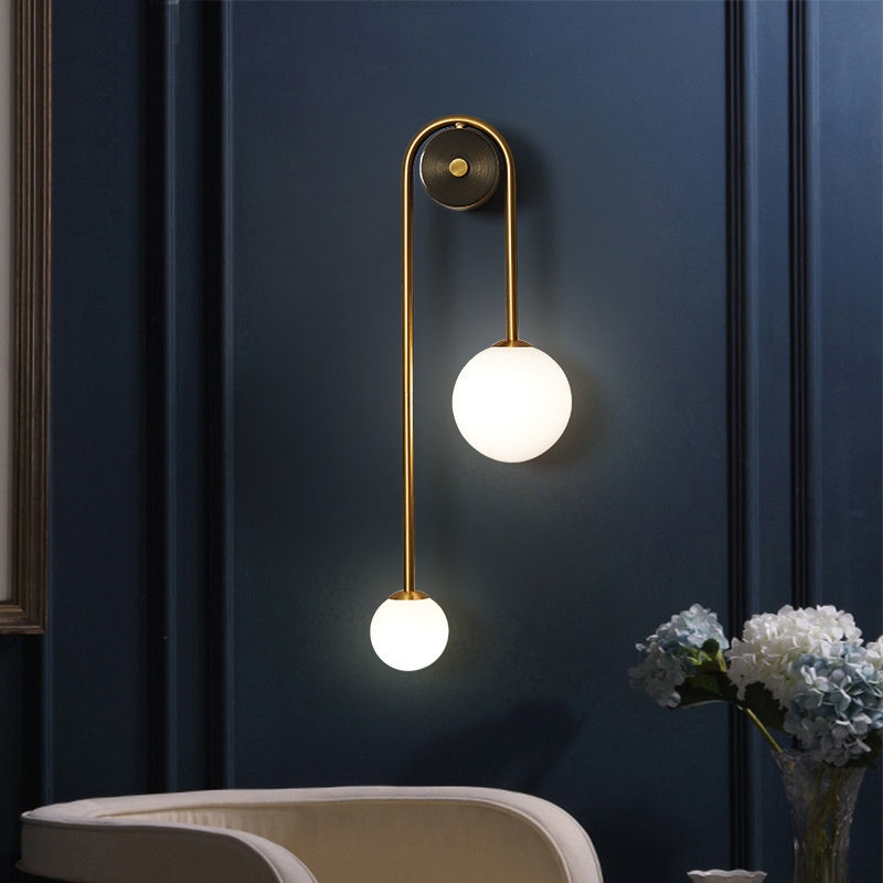 Doré Golden Accent Wall Lamp - mounted in living room