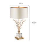 Cristalys table lamp in a living room setting