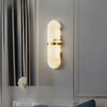 Carrare Marble-Effect Wall Lamp - mounted above bedroom headboard