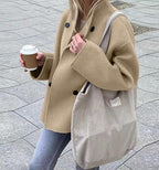Manteau à double boutonnage