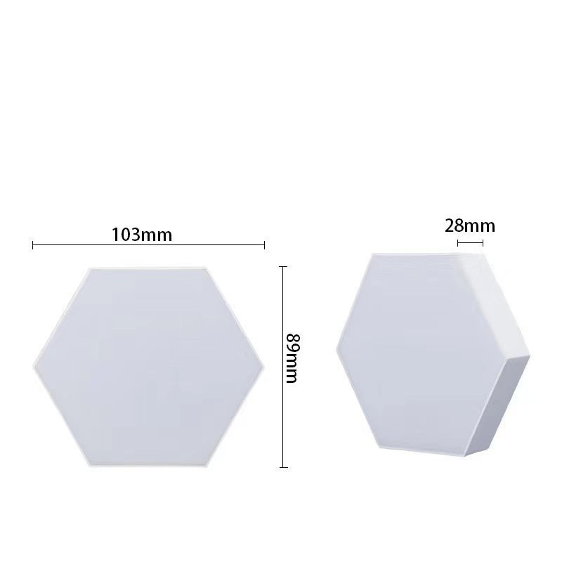 Hexagone panels styled in a media room