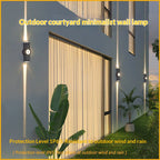 Quatuor pillar light mounted at an entrance