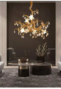 Branche de Cuivre Copper Crystal Chandelier - hanging over grand dining table