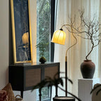 Héritage lamp switched on, drum shade glow
