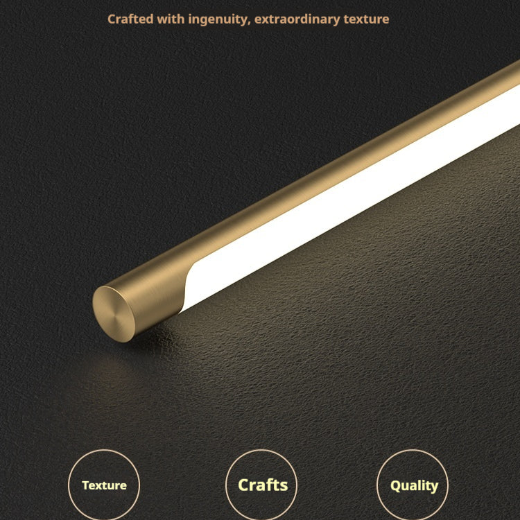 Articulé brass lamp switched on, directional light