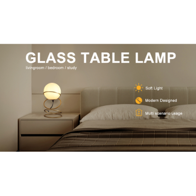 Aurea Spiral Glass Globe Bedside Lamp - illuminated warm glow at night