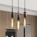 Trio Noir black pendant light set above a kitchen island