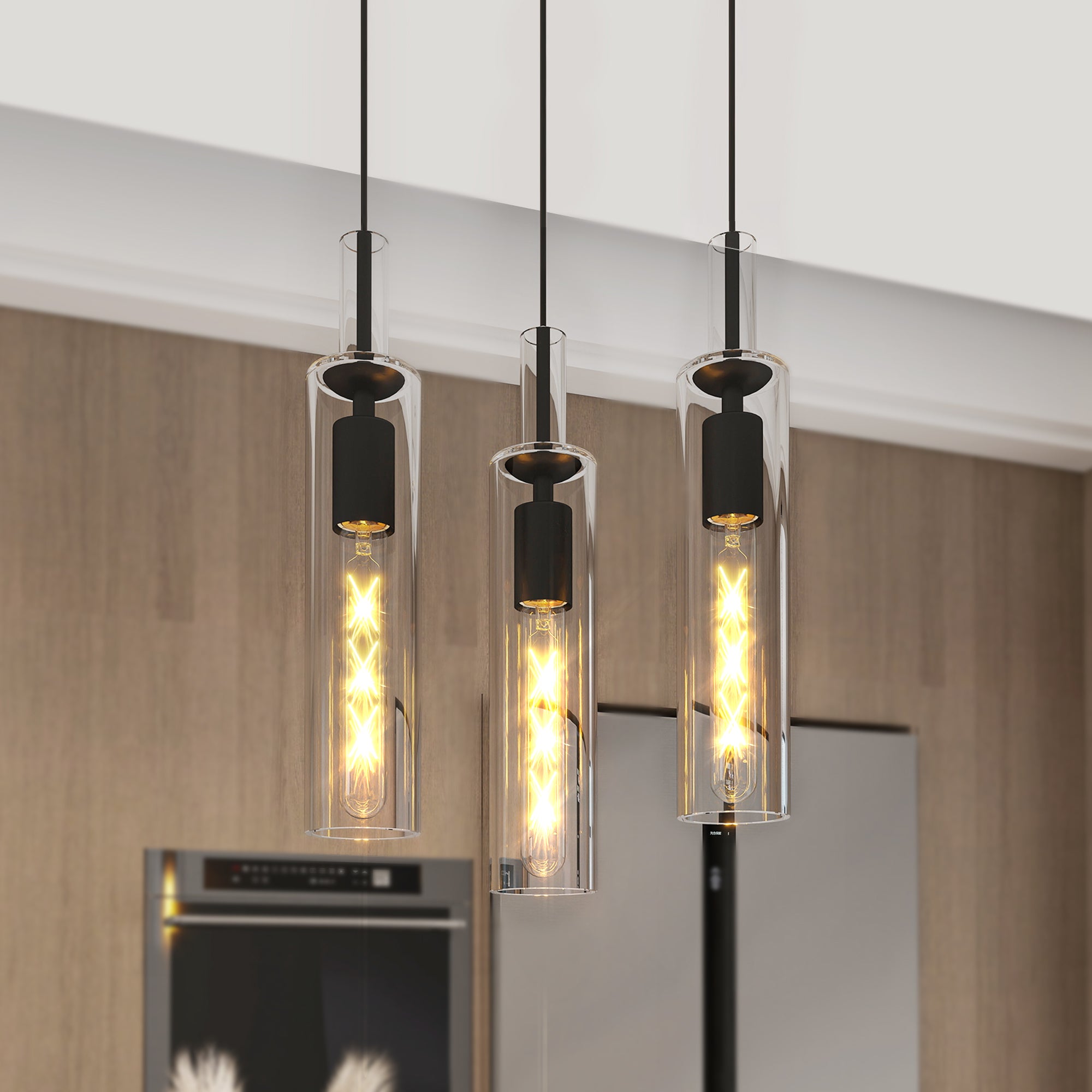 Trio Noir black pendant light set above a kitchen island