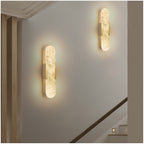 Marbre Doré sconces styled in a hallway