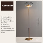 Noyer floor lamp styled beside a reading chair