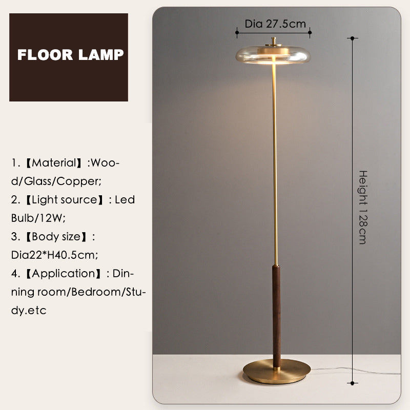Noyer floor lamp styled beside a reading chair