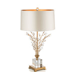 Cristalys crystal lamp styled on a sideboard