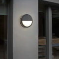 Nordique European outdoor wall lantern mounted beside a door
