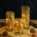 Étoile glass star night light glowing on a shelf