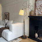 Héritage solid wood floor lamp in a living room
