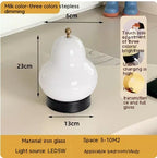 Poire lamp styled on a dinner table