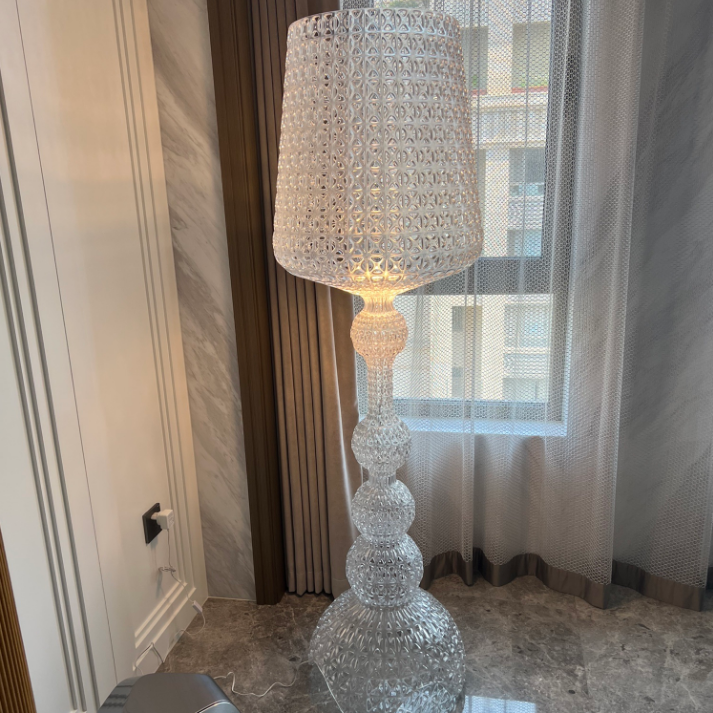 Ajour Sculptural Hollow Floor Lamp - illuminated ambient glow at night
