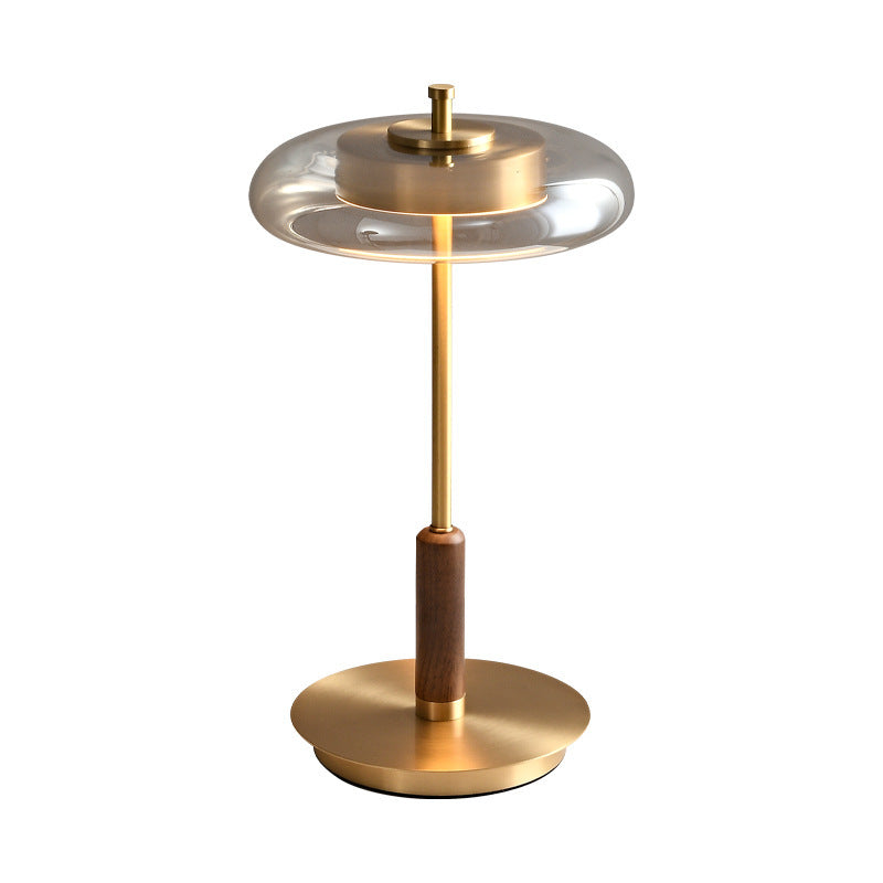 Noyer floor lamp switched on, warm glow