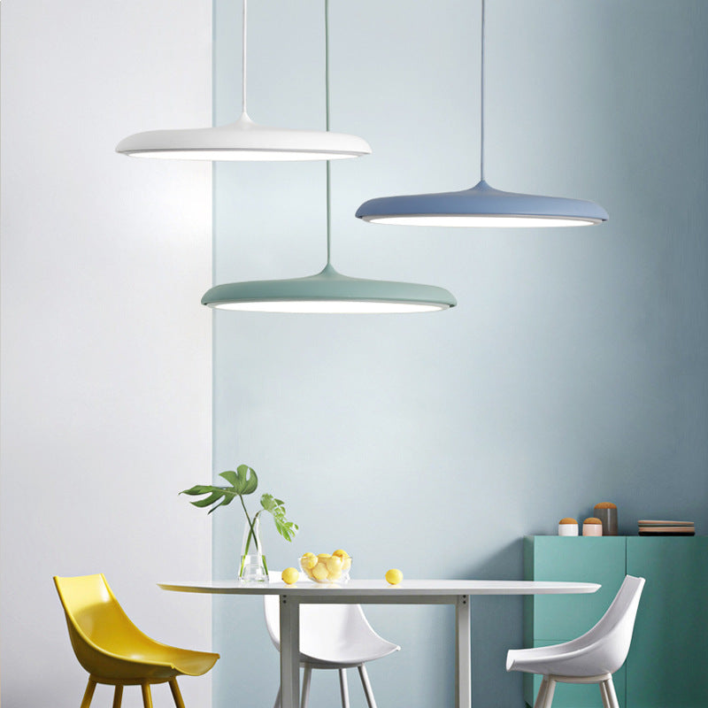 Nordique Minimalist LED Chandelier - hanging over dining table