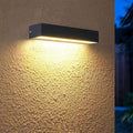 Linéaire outdoor wall light mounted on a facade