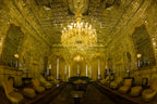 Regal K9 Crystal Tiered Chandelier as the centerpiece of a formal dining room