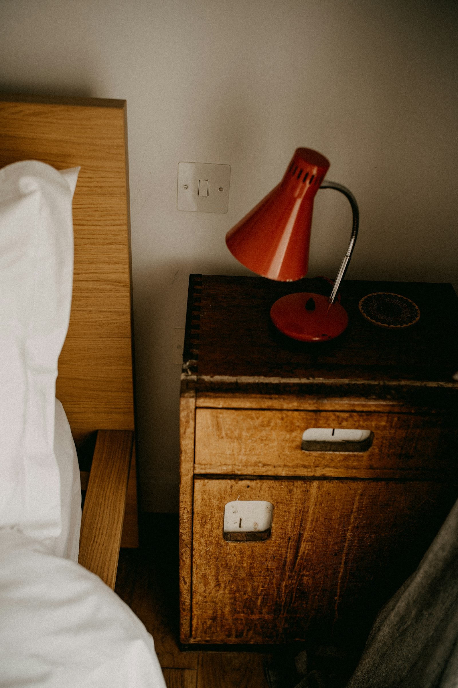 Orbit Touch-Dim Bedside Lamp lifestyle detail view, on a bedroom nightstand